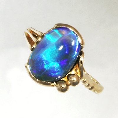 14k Yellow Gold Ring with a SOLID BLACK OPAL RARE Ribbon pattern. Peacock fire. SEE VIDEO 